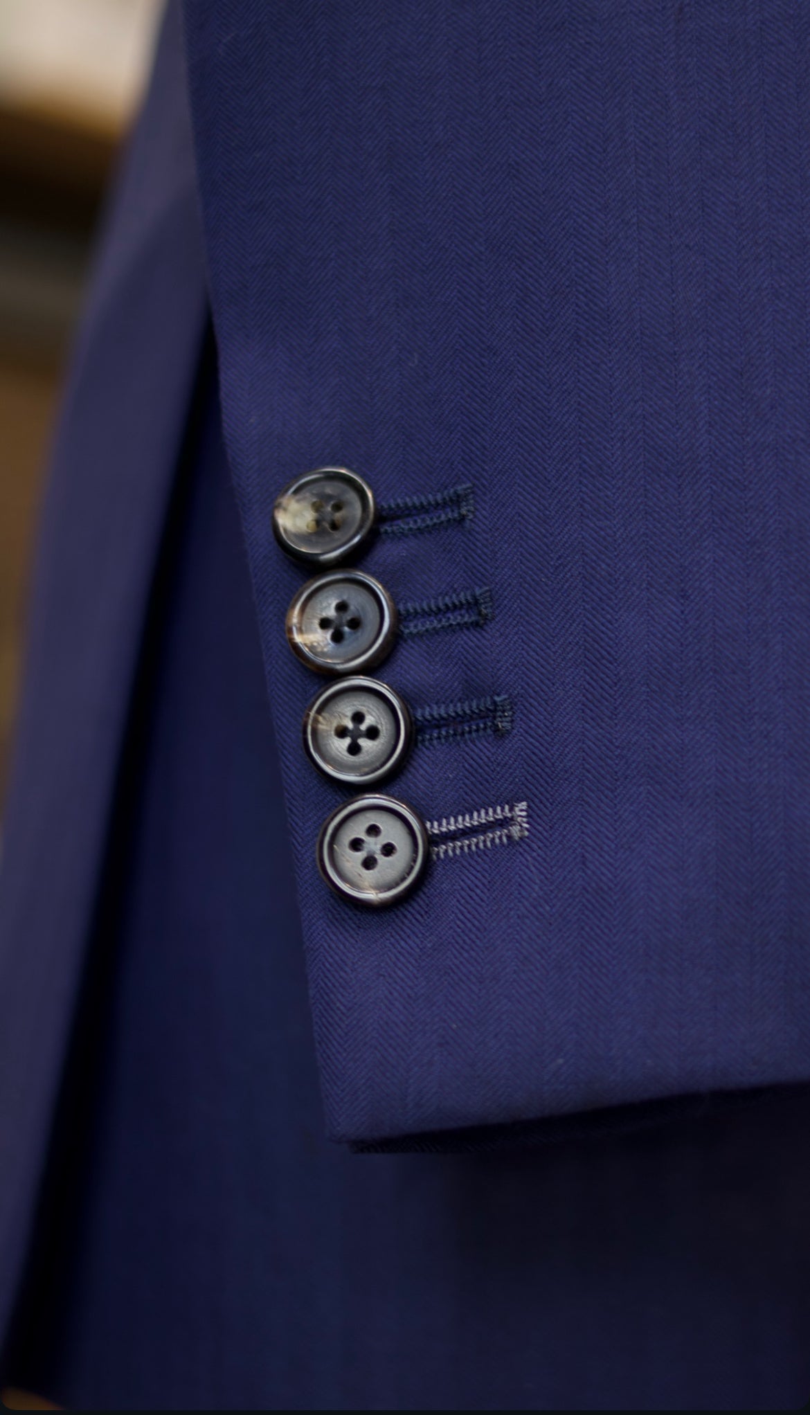 What Are Contrasting Buttonholes? A Guide to Contrast Stitching on Suits