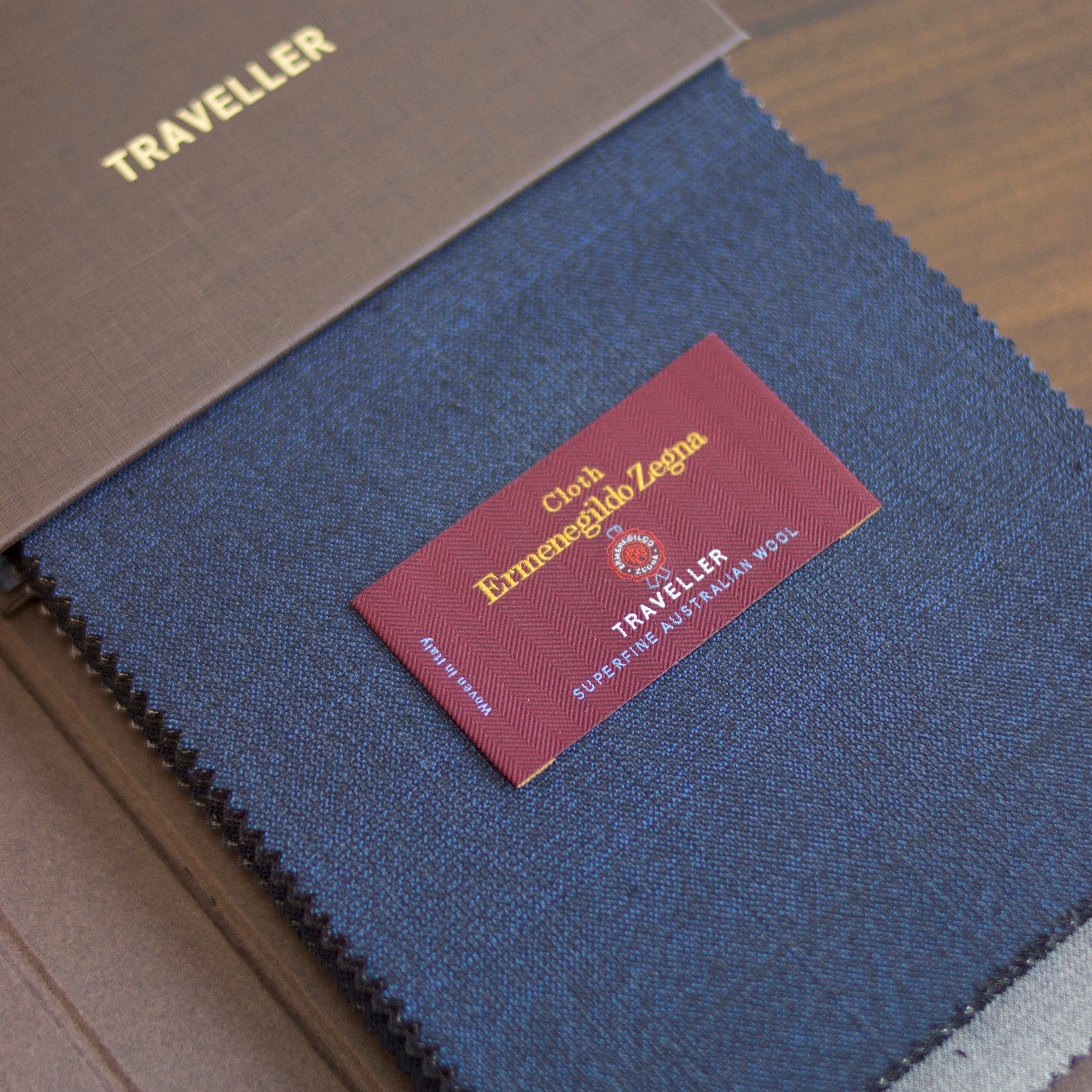 Ermenegildo Zegna Traveller 259 fabric book with blue Superfine Australian Wool swatch and woven Traveller label