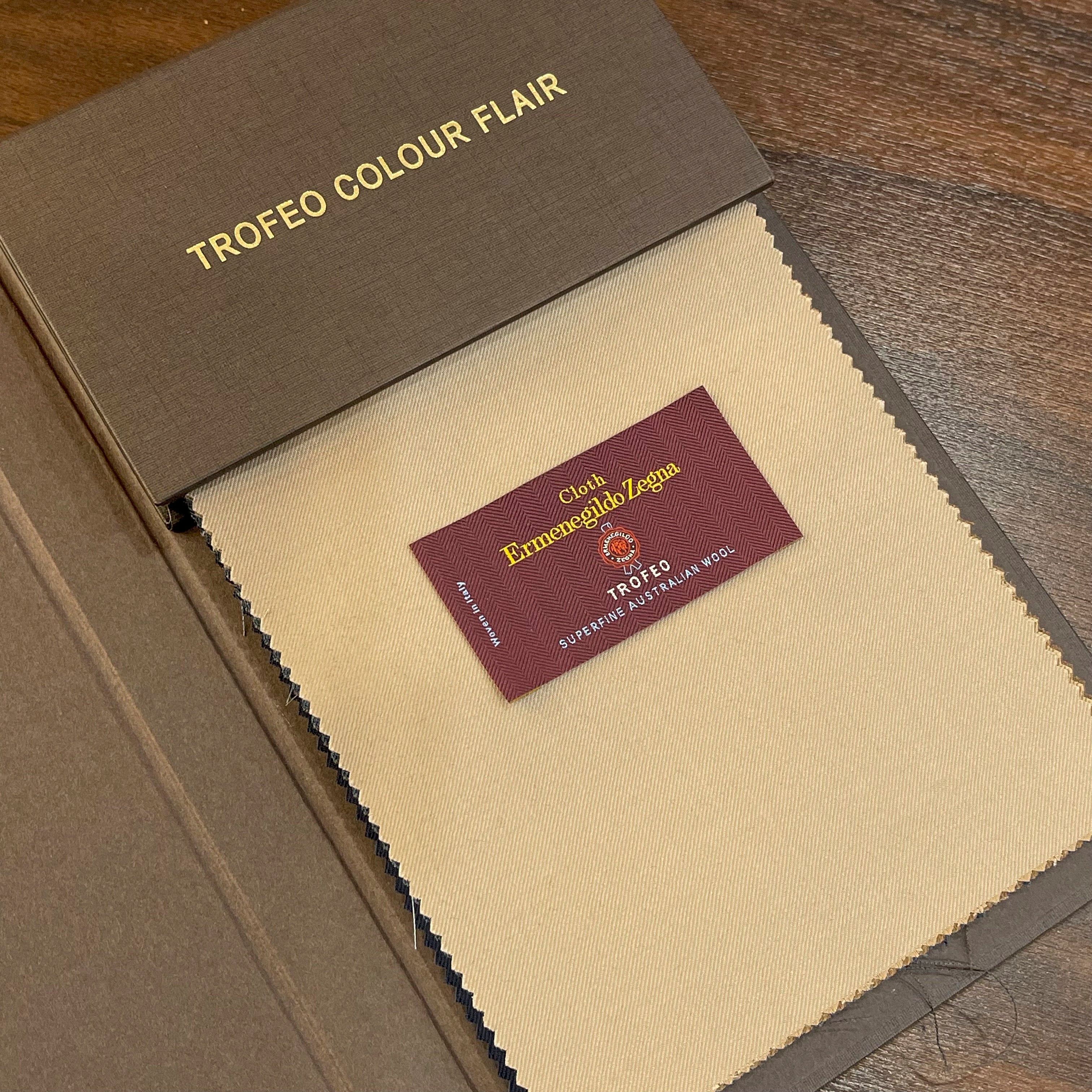 Ermenegildo Zegna Trofeo Colour Flair fabric sample book with beige Superfine Australian Wool swatch and woven Trofeo label