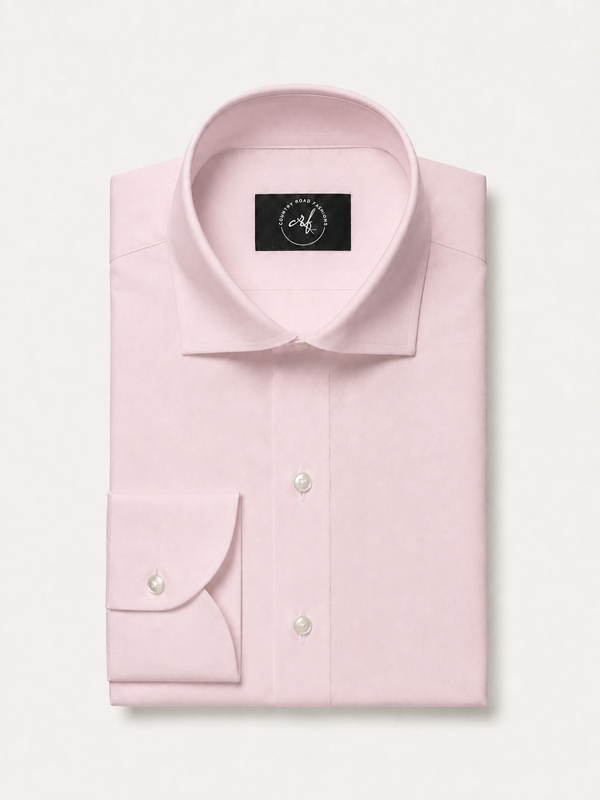 Blush pink solid non-iron cotton shirt, folded