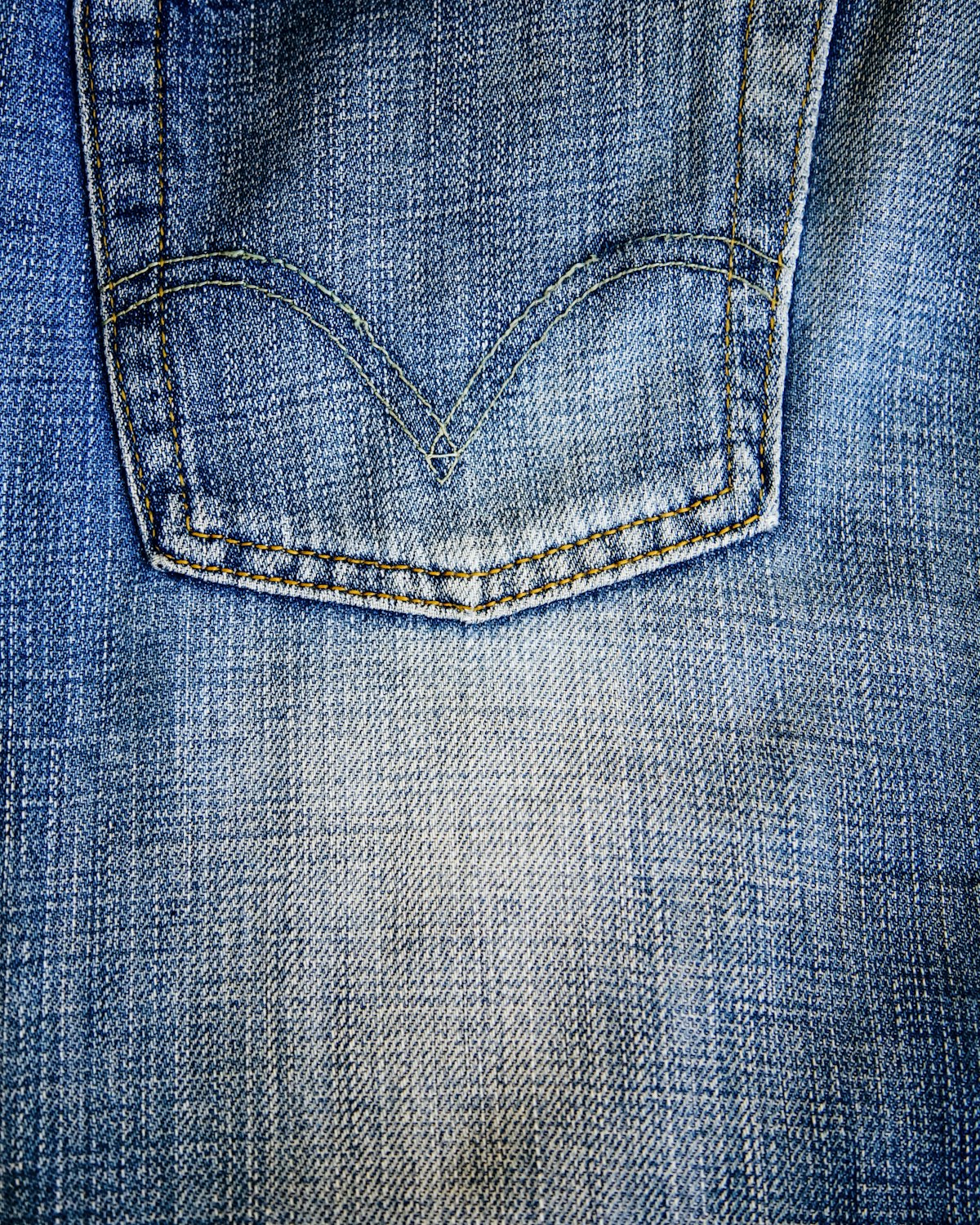 Back pocket of custom jeans